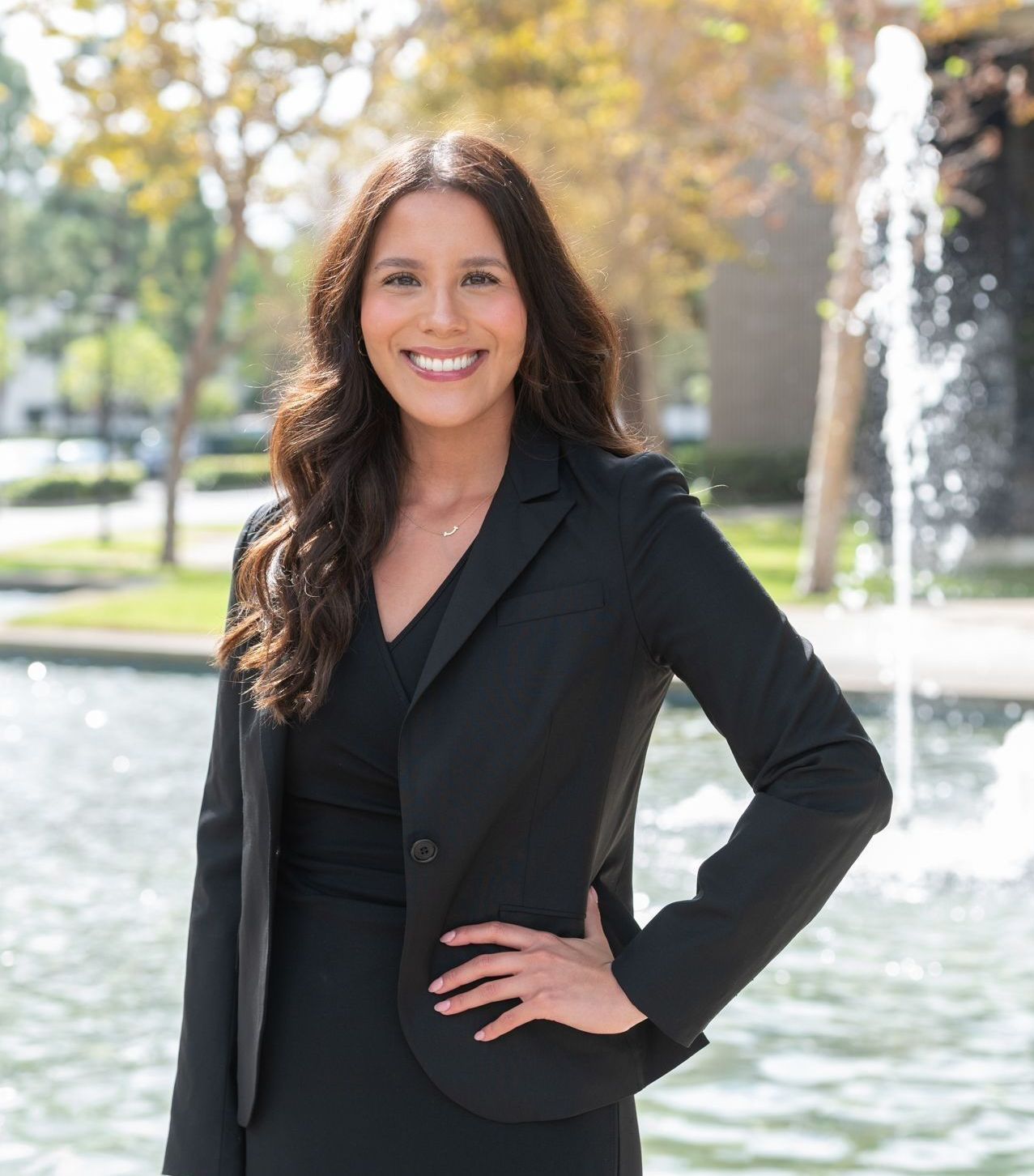 Celina Estrada, Esq., Associate Attorney at Harris & McKeown Law Firm, in black blazer outdoors