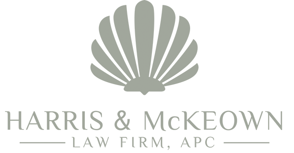 Harris & McKeown Law Firm logo with stylized shell design