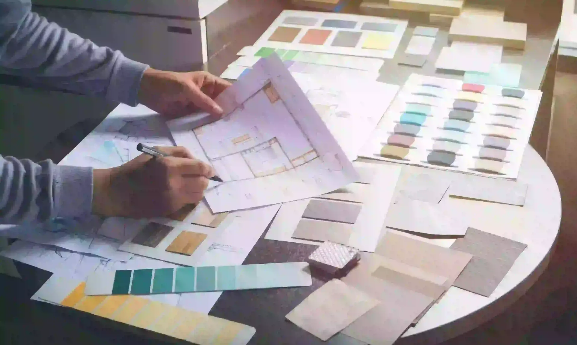 Designing a custom walk-in closet with many glass doors and lighting in Sarasota, FL