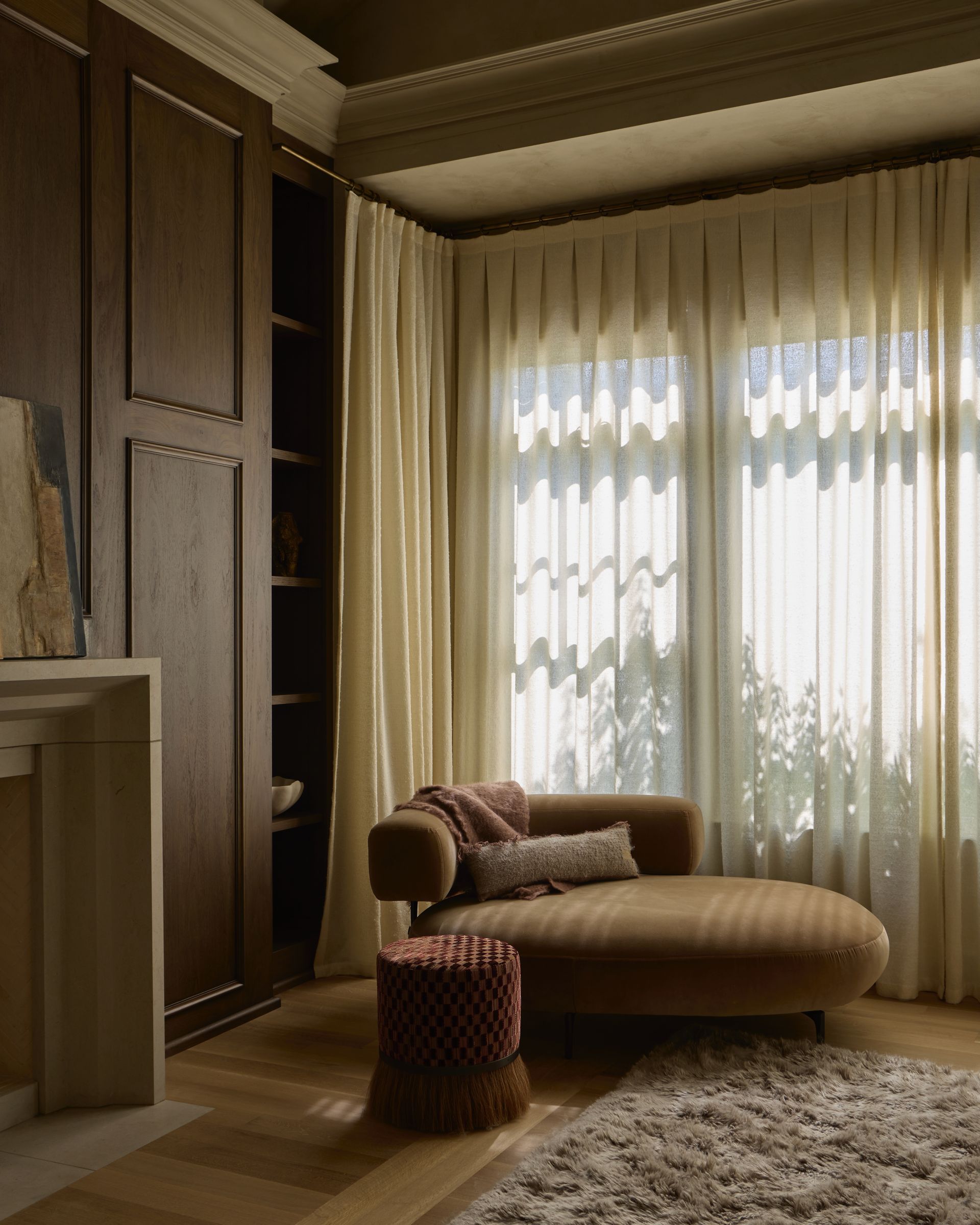 Layered custom drapery installed in luxury residential interior