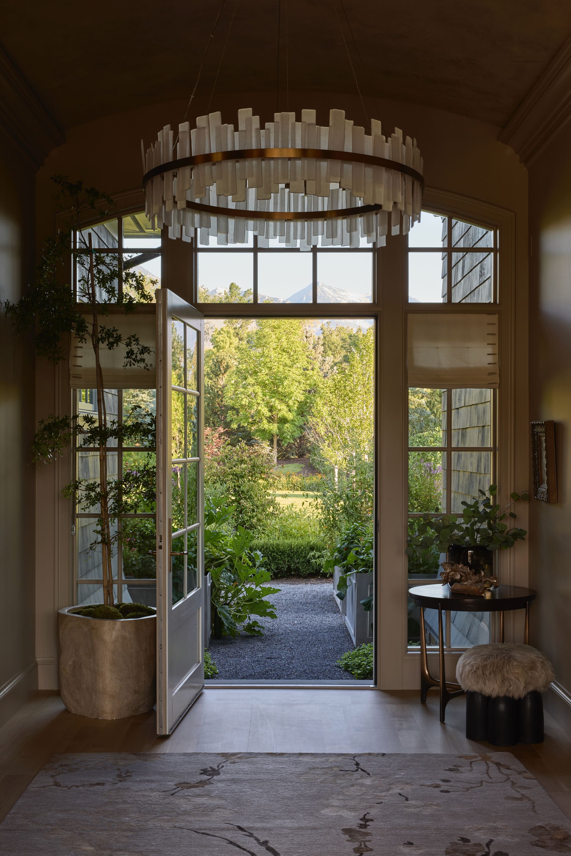 Luxury great room with custom window treatments and architectural details