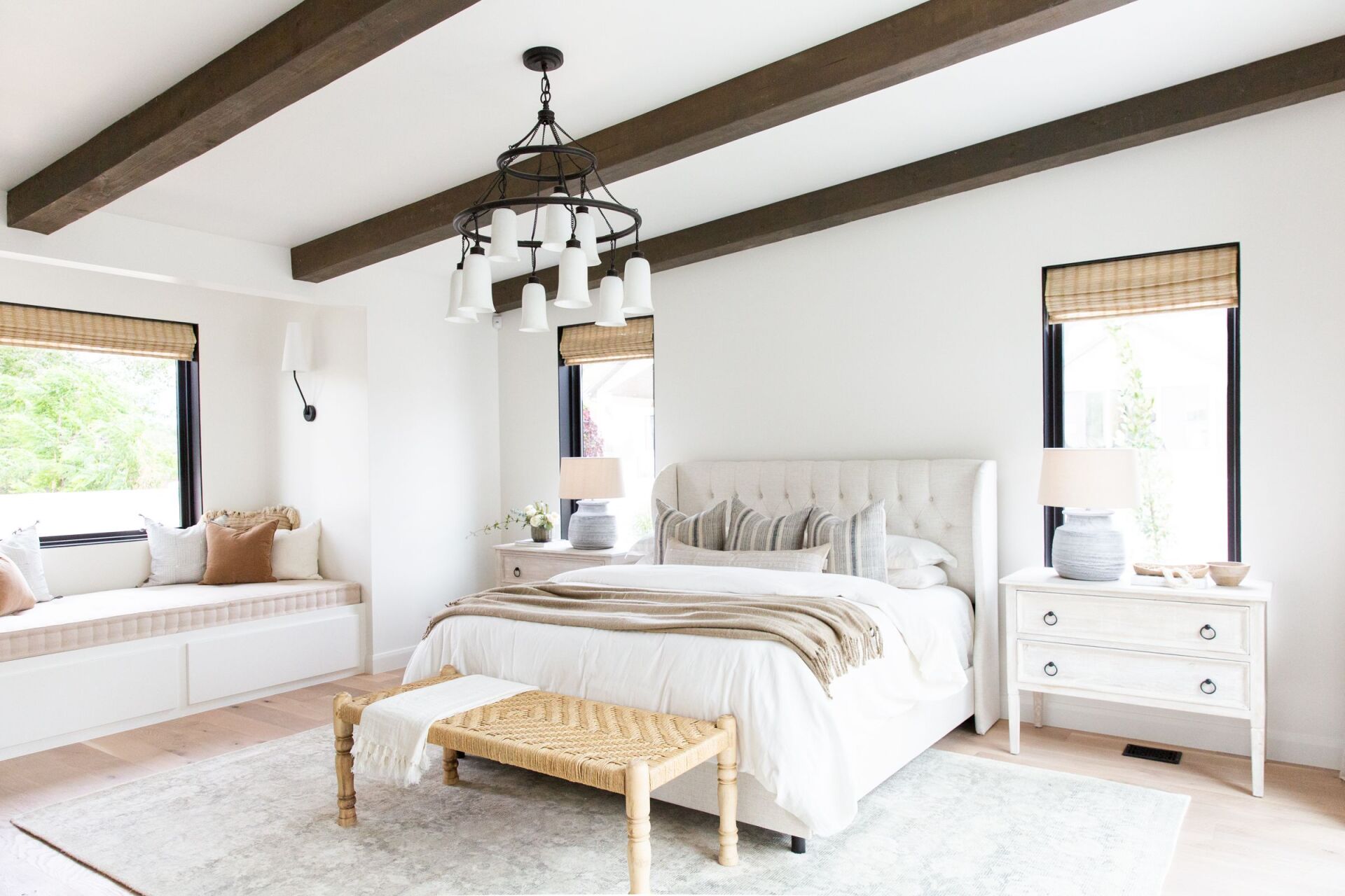 Custom window treatments and Roman shades in luxury mountain bedroom