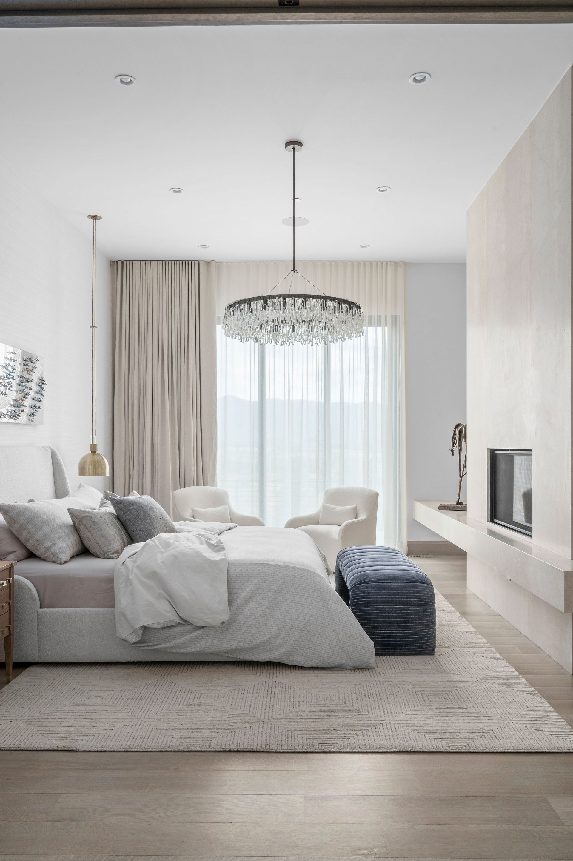 Custom window treatments in modern dining room with expansive views