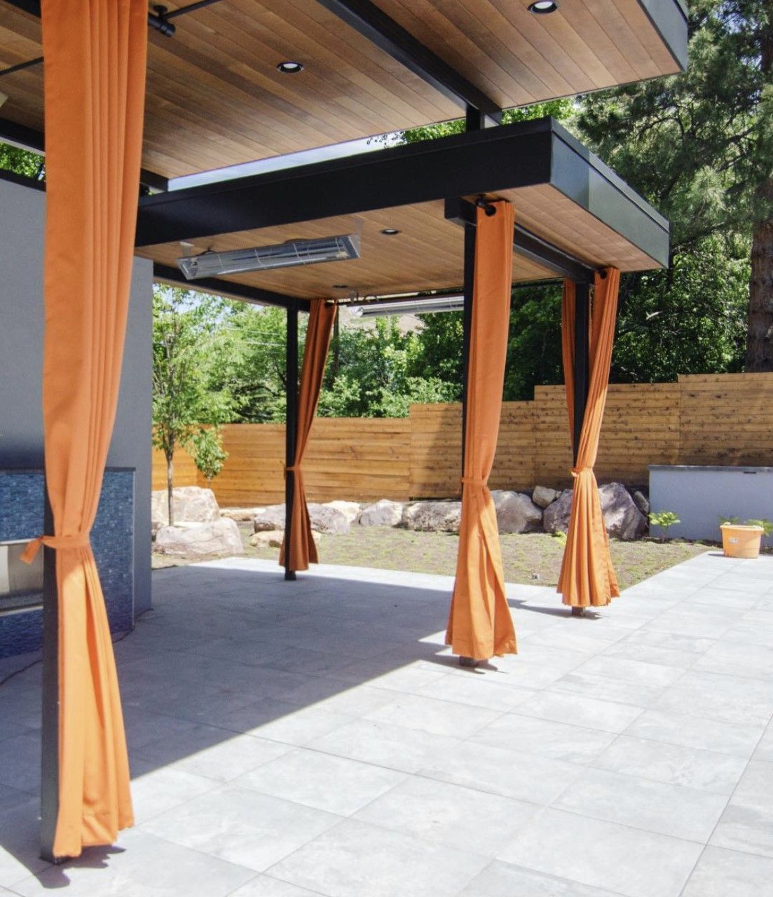 Motorized outdoor shades and custom drapery for covered patio