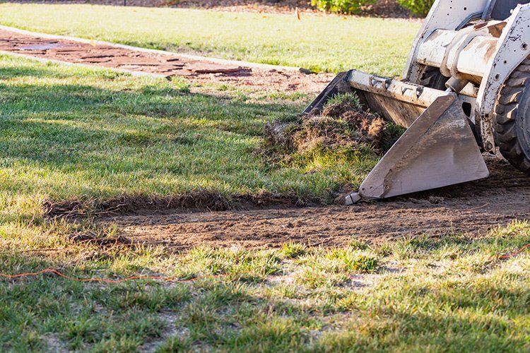 Removing Grass from Yard — Annandale, MN — OTS Grading and Landscaping LLC
