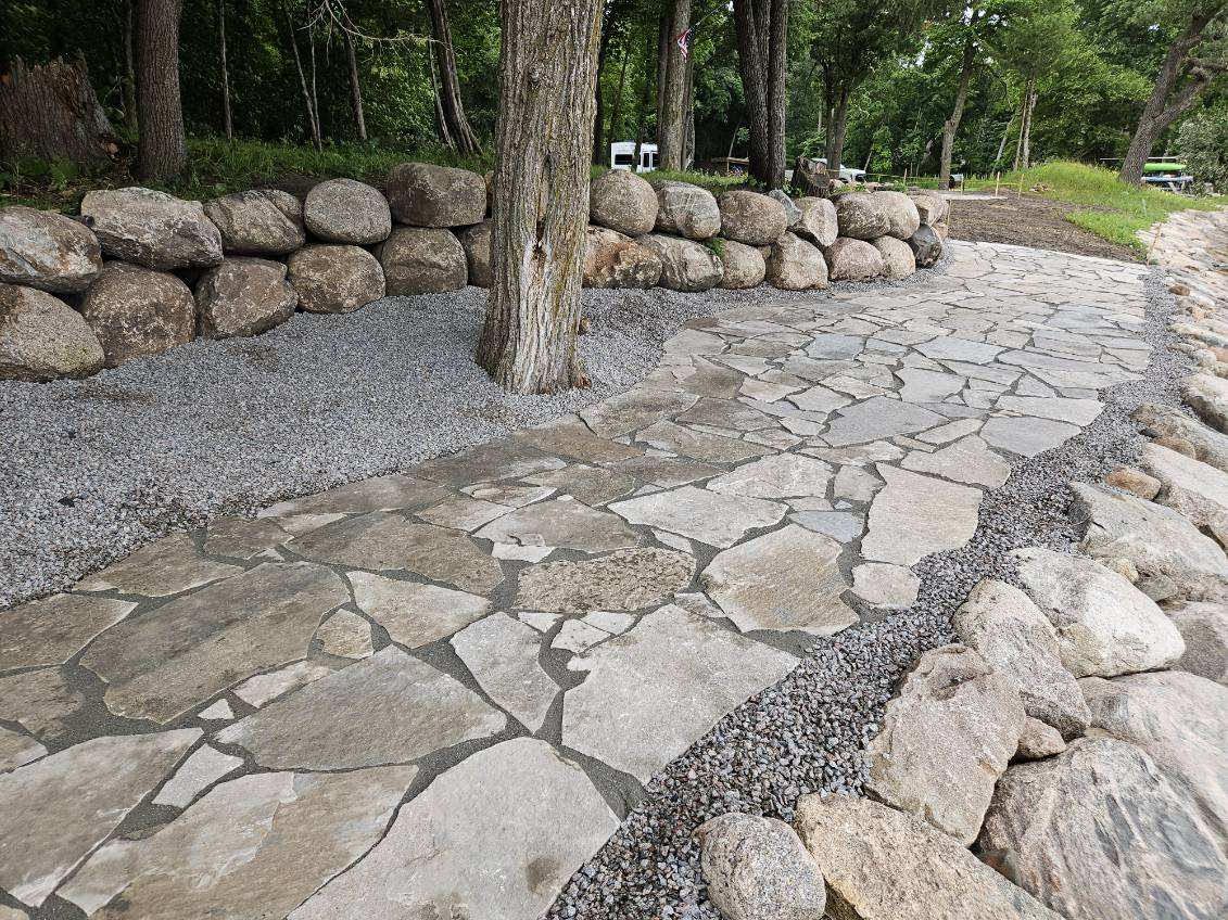 Garden with Stone Steps and Fire Pit — Annandale, MN — OTS Grading and Landscaping LLC Garden with Stone Steps and Fire Pit — Annandale, MN — OTS Grading and Landscaping LLC