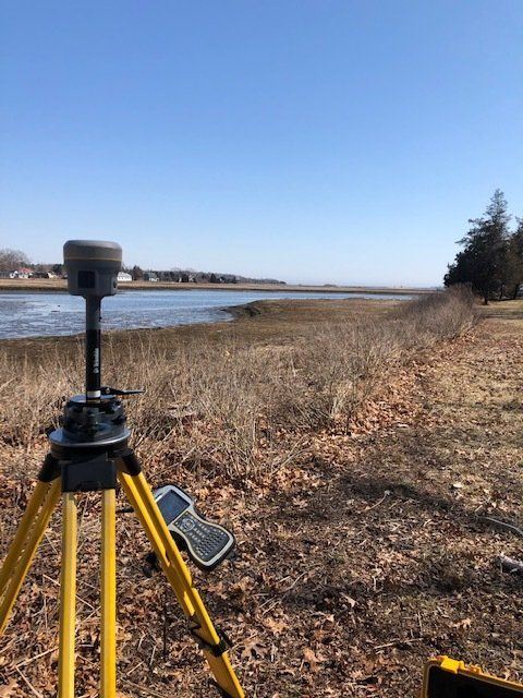 Land Surveying — Man Surveying The Land in Mattapoisett, MA