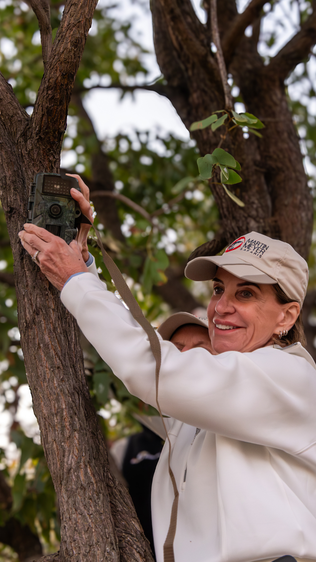Dr Jessica Briner examines snake after capturing it