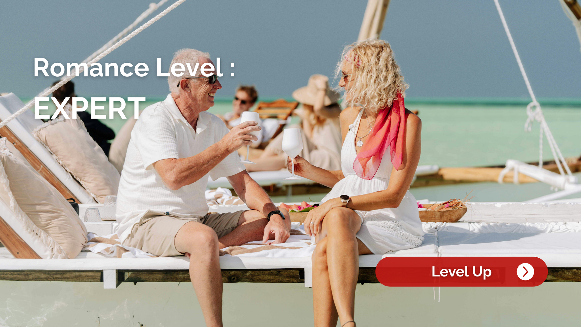 Couple toasting with wine on a beach, labeled