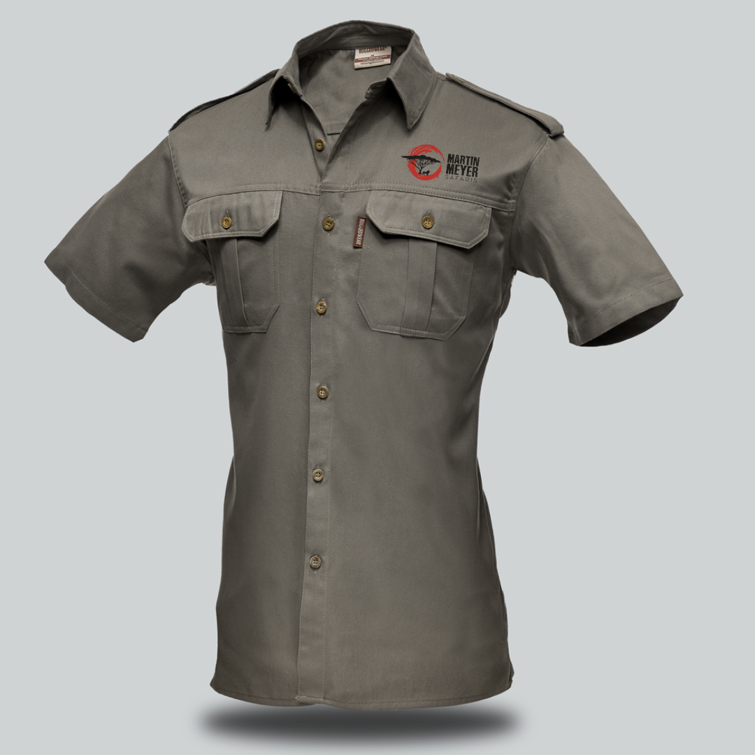 A short-sleeved khaki button-down shirt with two chest pockets and a logo on the left breast.