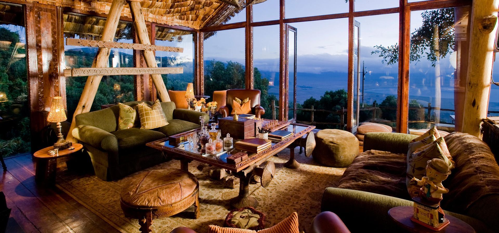 A living room with a lot of furniture and a Ngorongoro Crater