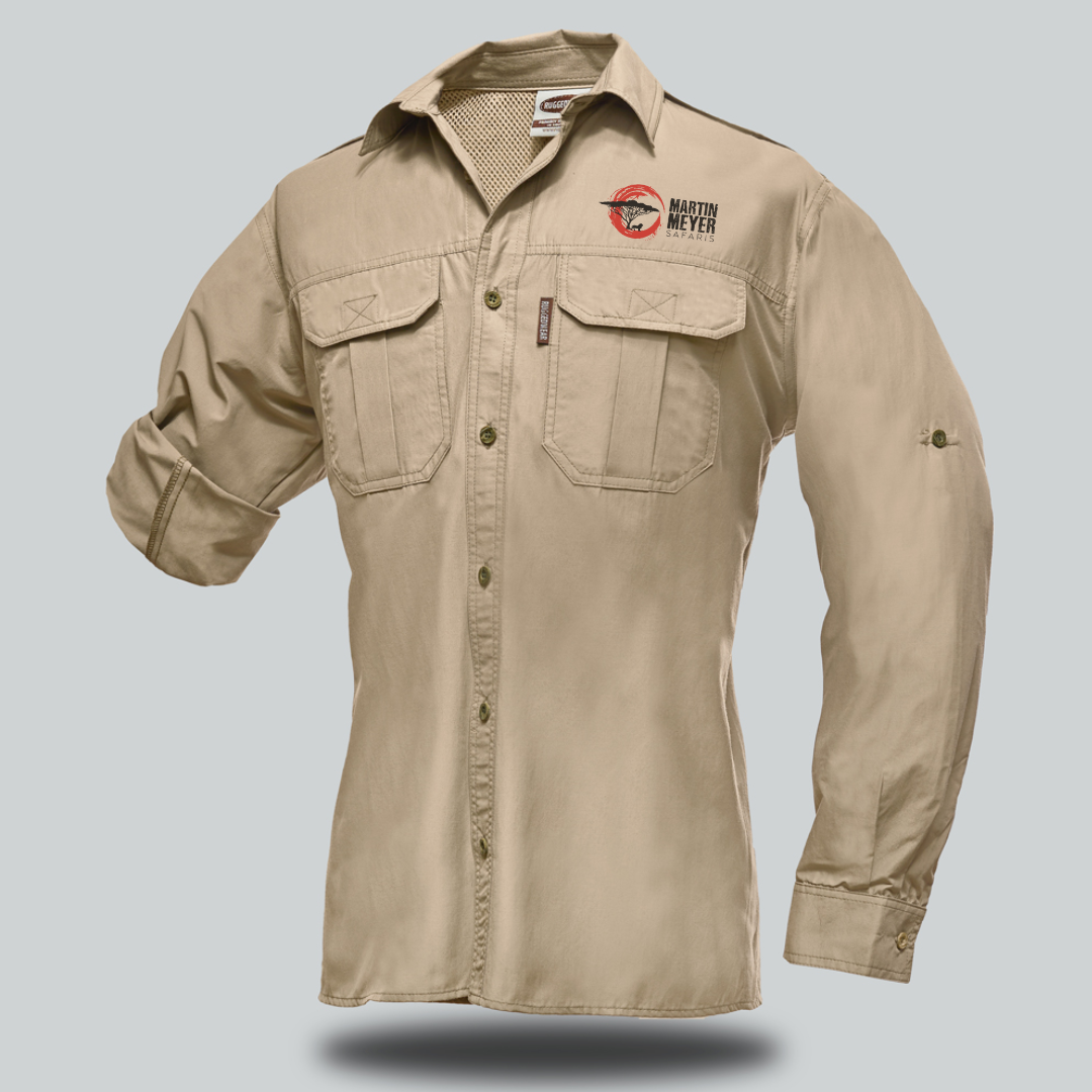 Khaki-colored long-sleeved button-down shirt with two chest pockets. Features a logo on the chest and rolled-up sleeves.