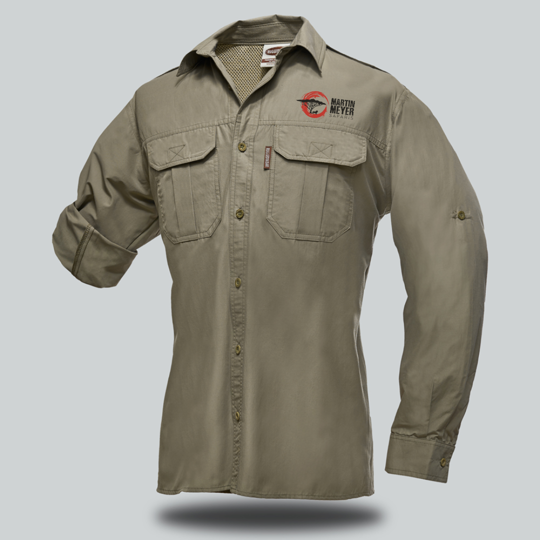 Khaki-colored long-sleeved button-down shirt with two chest pockets. Features a logo on the chest and rolled-up sleeves.