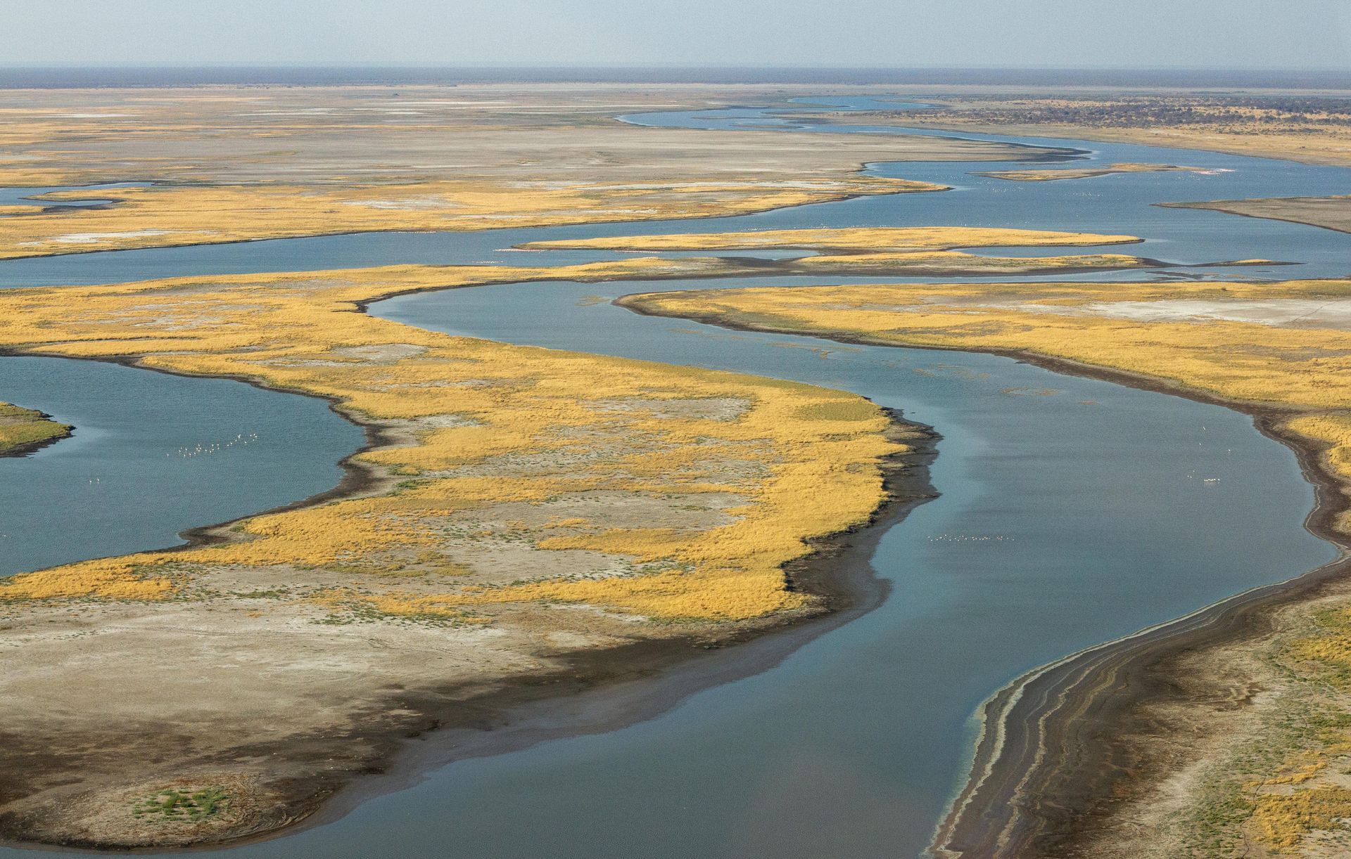 Winding Okavango Delta against a blue sky