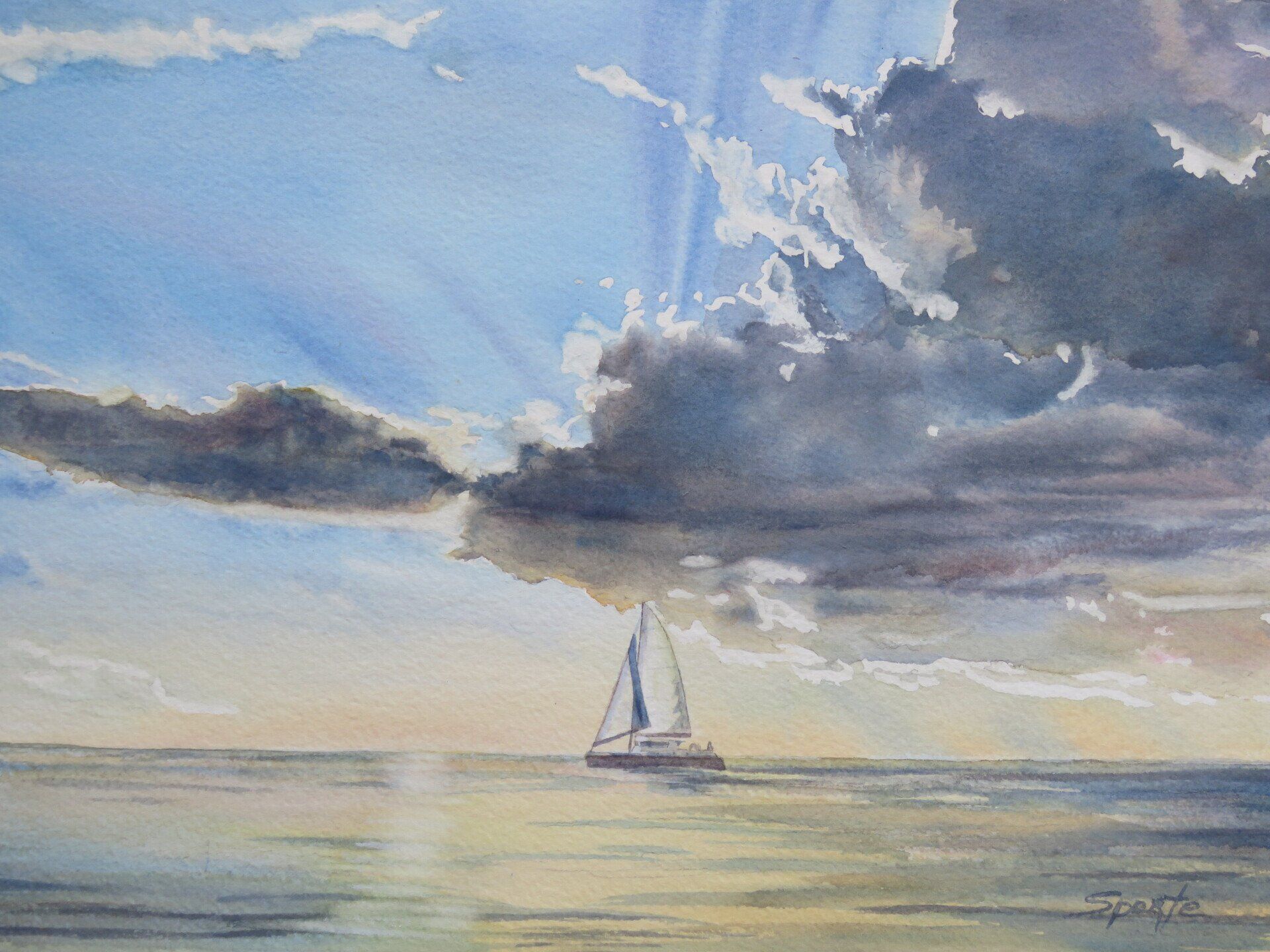 Sailboat on calm water beneath dramatic, sunlit clouds.