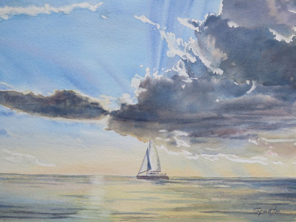 Sailboat on calm sea under dramatic, sunlit clouds.