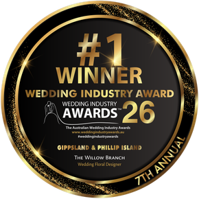 A circular gold and black badge declaring The Willow Branch the #1 Wedding Florist winner for Gippsland & Phillip Island '25.