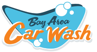 A clean guarantee sticker with a check mark on it. Bay area carwash.