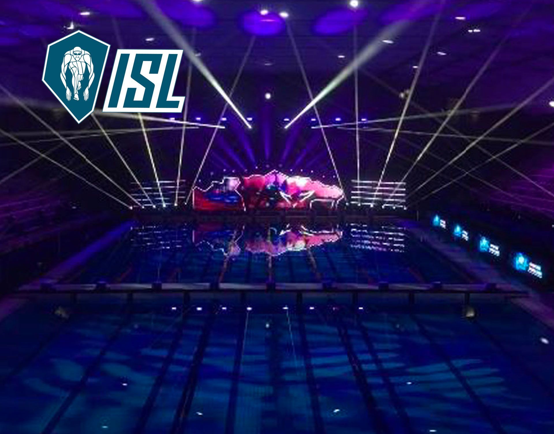 Concert stage lit with purple lights and laser beams, ISL logo in the upper left