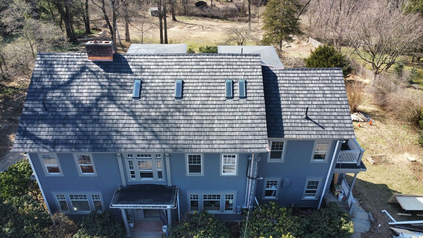 Brava synthetic shake roof with copper trim installed in Amherst MA
