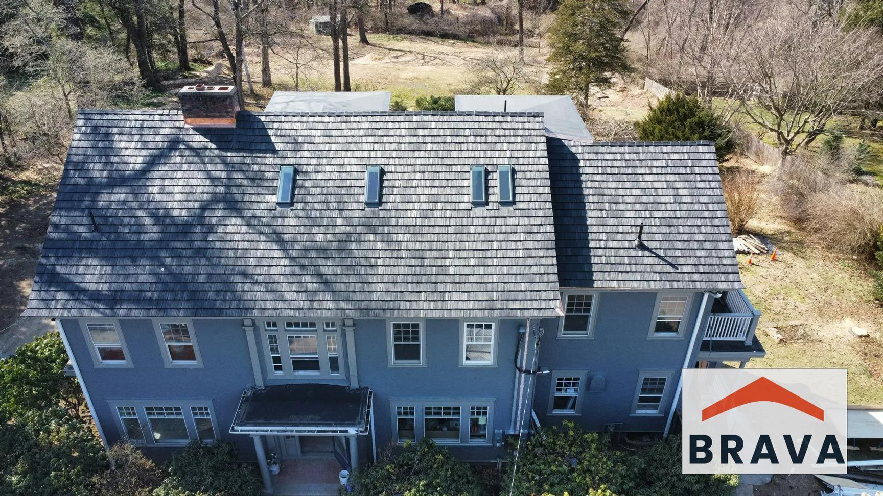 Brava synthetic shake roof with copper trim installed in Amherst MA
