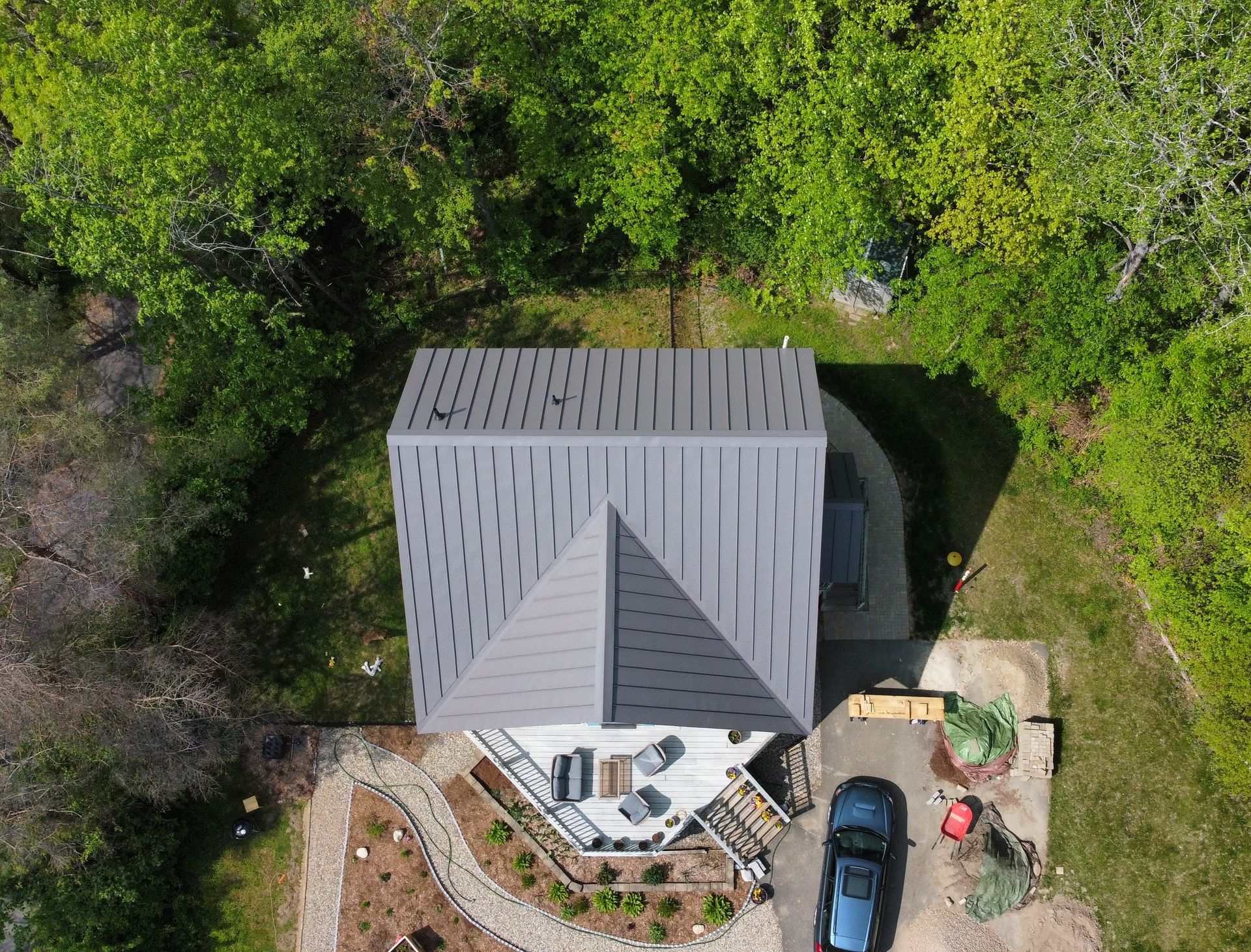 gray standing seam metal roof in Amherst MA