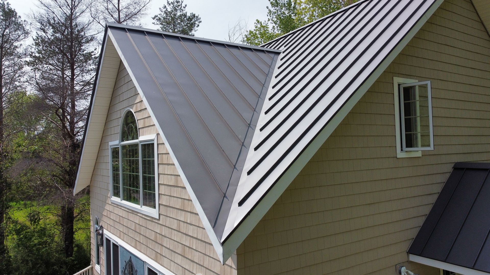 gray standing seam metal roof in Amherst MA