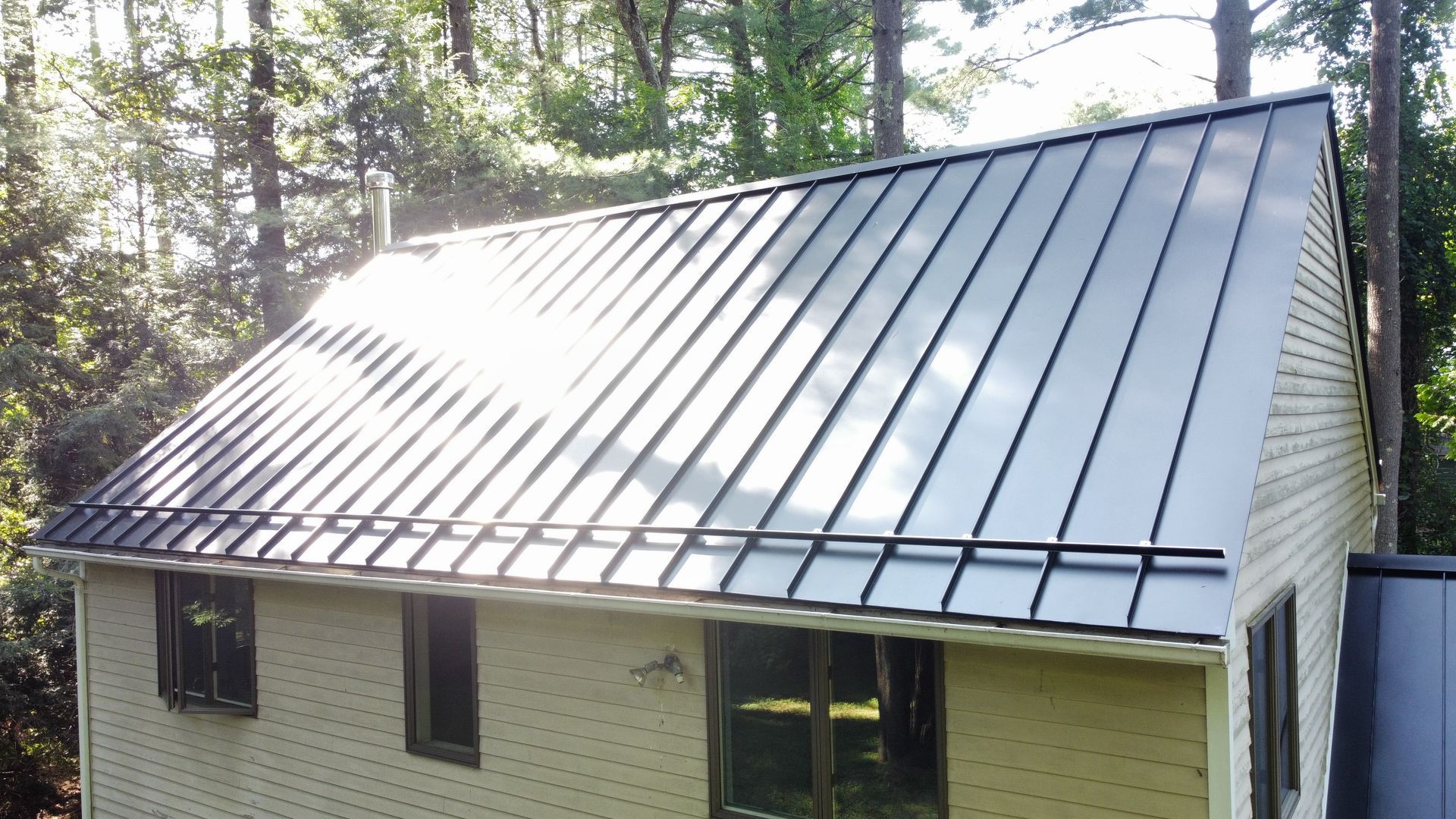 Black standing seam metal roof in Northampton MA
