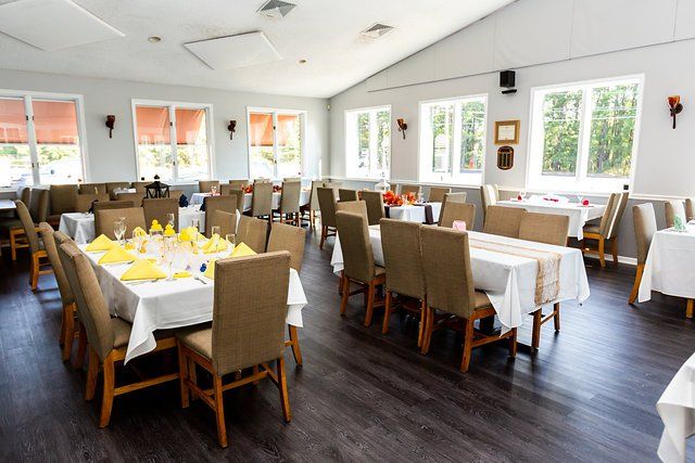 A large dining room filled with tables and chairs.
