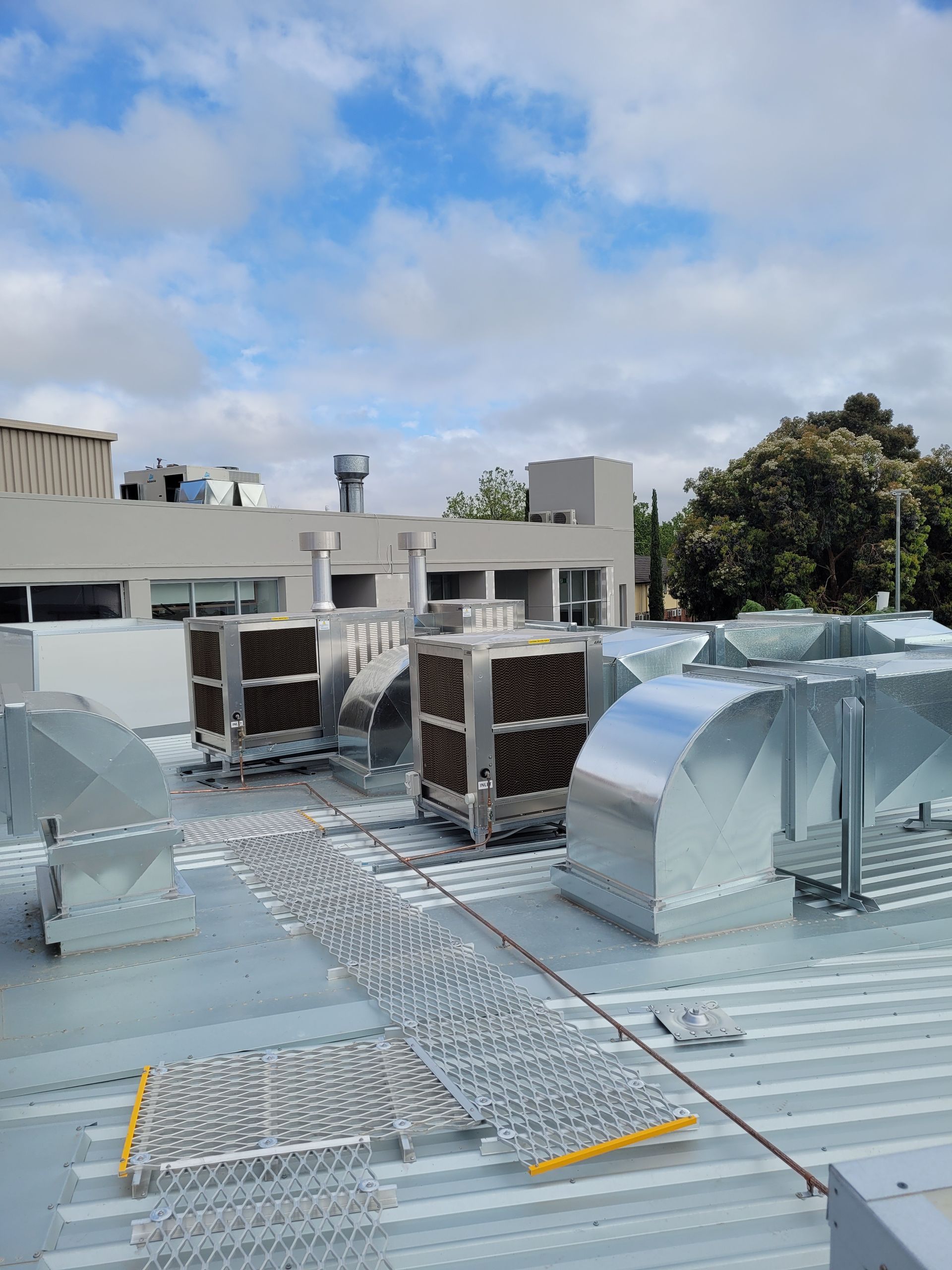 Electrician installing air conditioner | Albury, NSW | Aircom Airconditioning Services