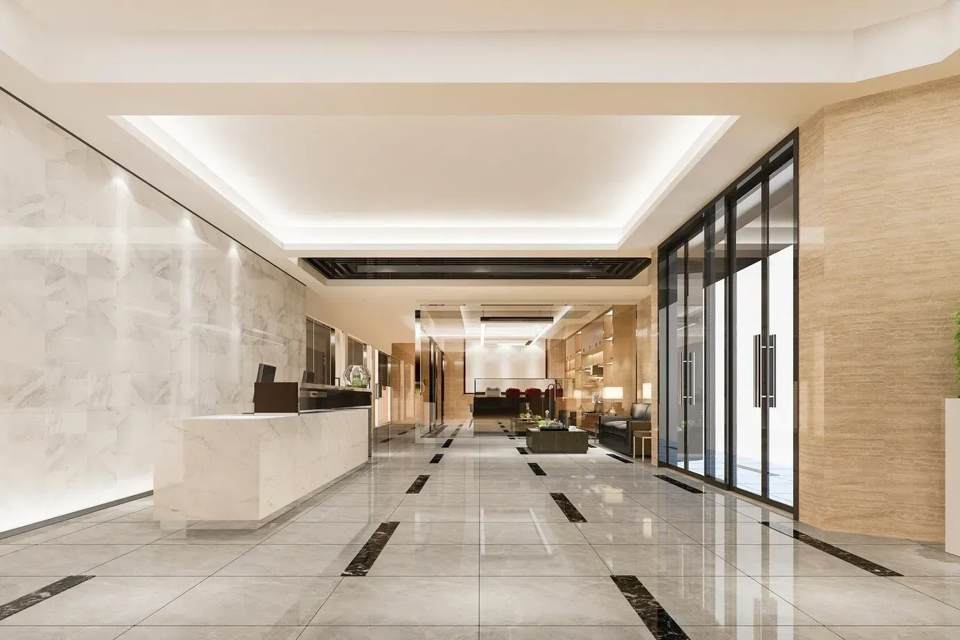 A large lobby with a marble floor and a reception desk in Los Angeles, CA