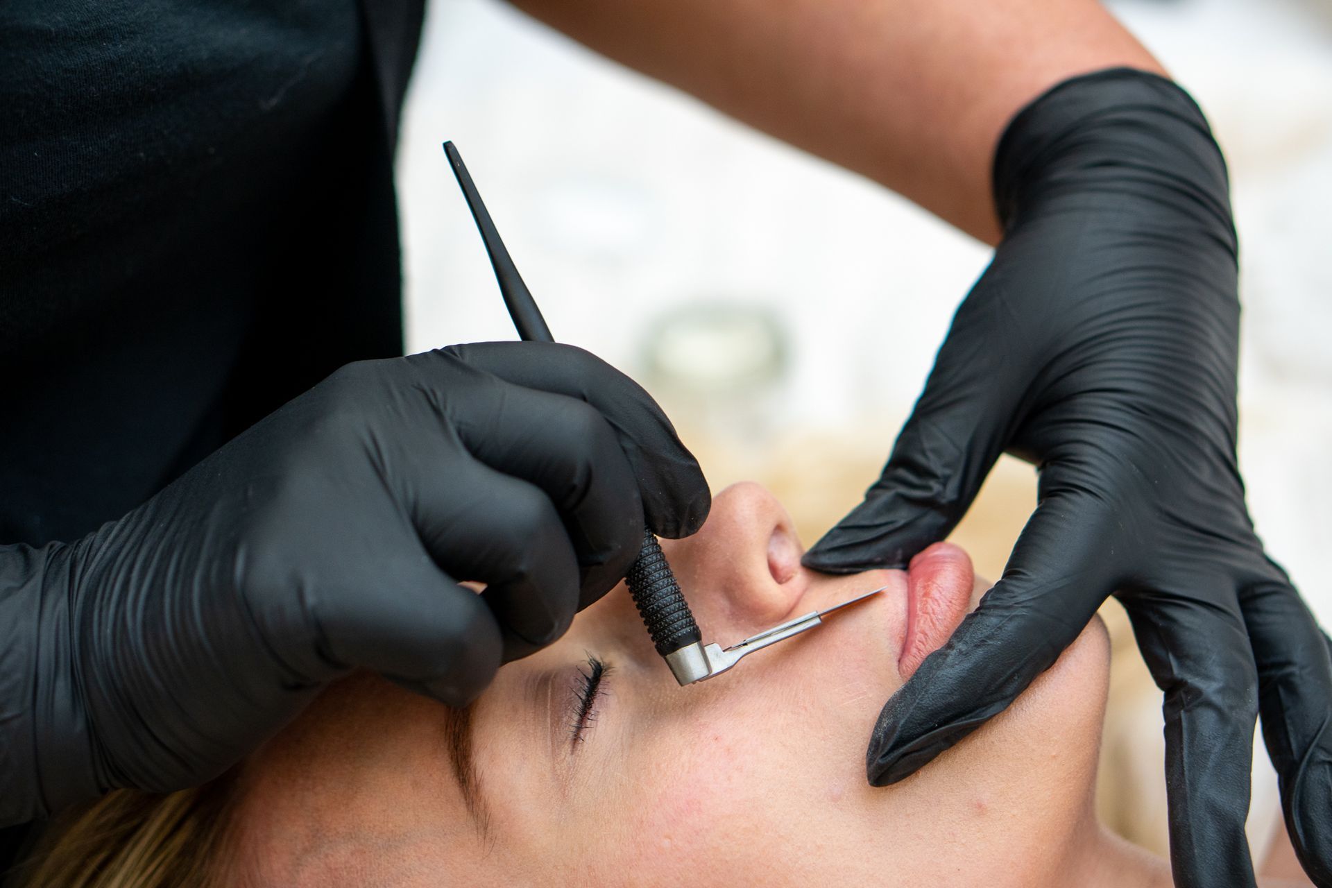 Dermaplaning treatment being performed on a client at The Beauty Hutley