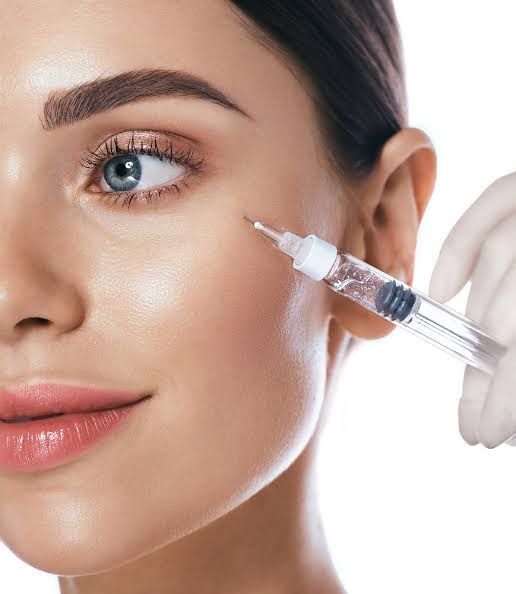 Woman receiving an injectable skin treatment.