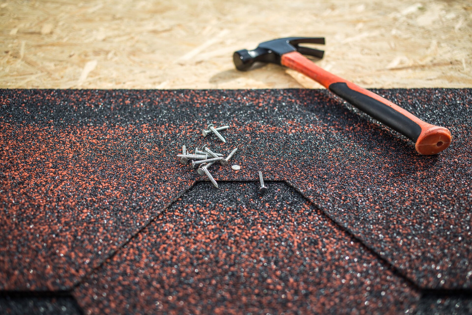 roofers repairing a roof