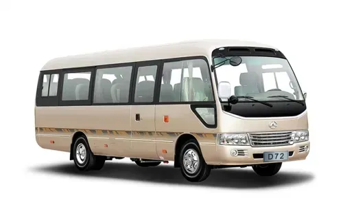 Beige minibus, side view, on a white background. It has windows, wheels, and headlights.