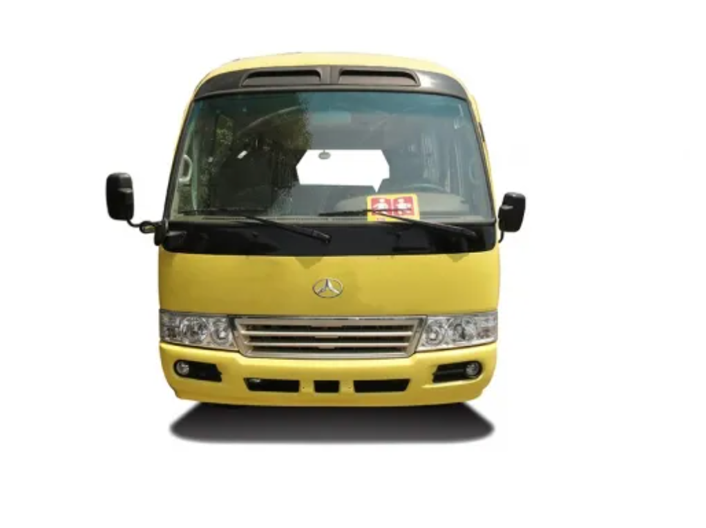 Yellow bus parked on a white background; side view, doors closed, windows visible.