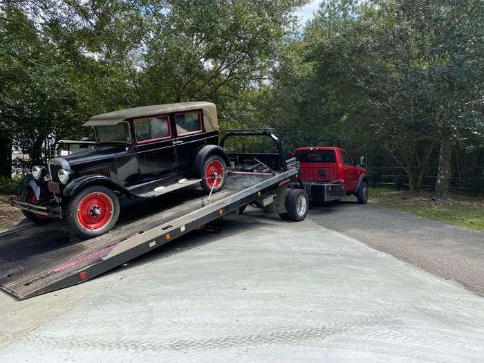 antique vehicle on trailer