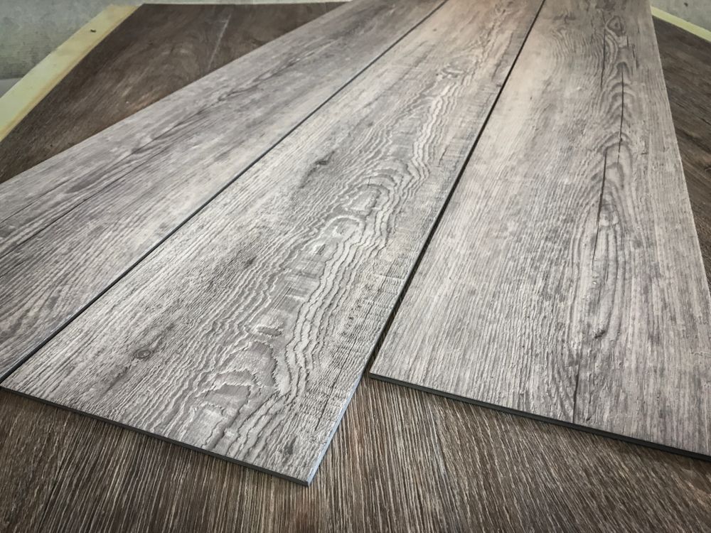 Three Pieces of Wood Are Laying on Top of Each Other on a Table — Marshall Notaras Hardwoods Pty Ltd In Grafton, NSW