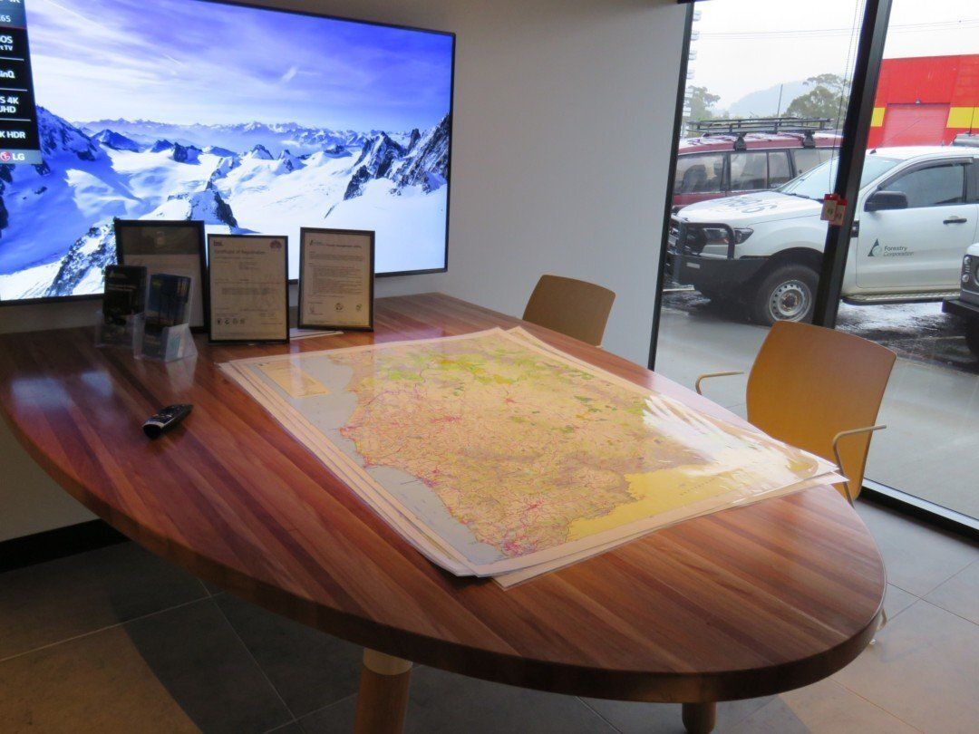 A Conference Room With a Large Map on the Table — Marshall Notaras Hardwoods Pty Ltd In Tamworth, NSW