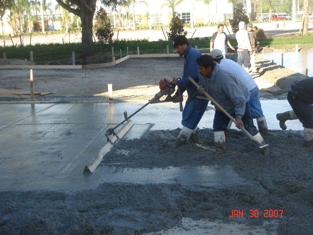 Men Working — Tampa, FL — DT Contracting Inc