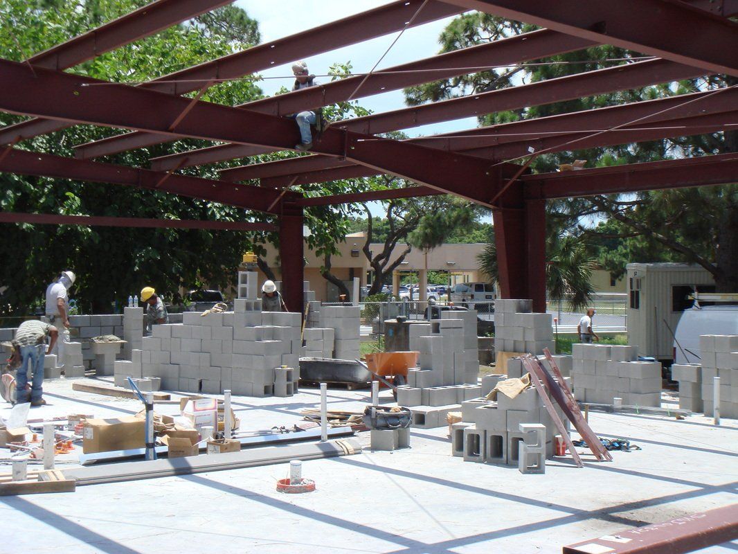 Construction Men Working At Commercial Building — Tampa, FL — DT Contracting Inc