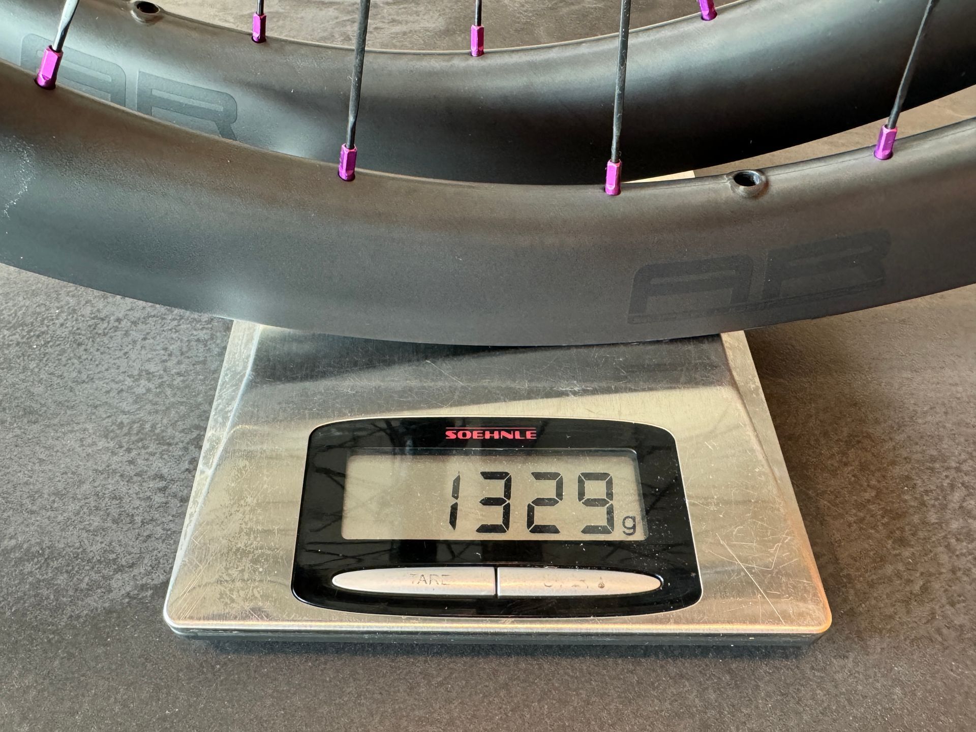 light allround carbon wheels on a scale