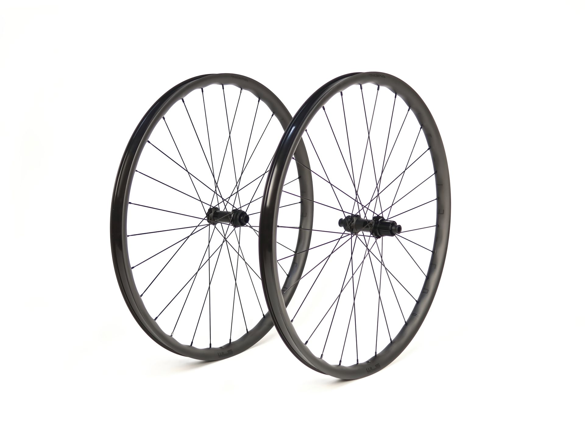 A pair of wide waved carbon taiwlind bicycle wheels on a white background.