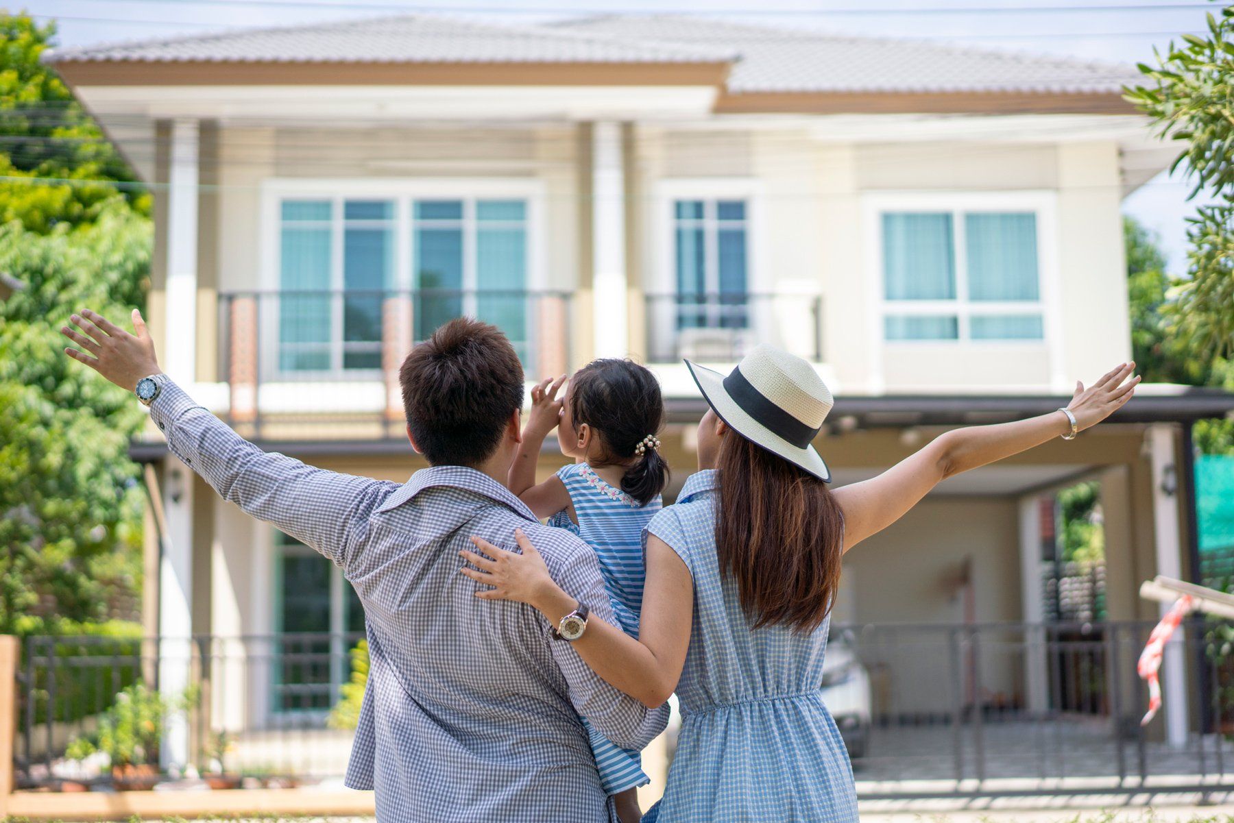 Family In Front Of The House — Fresno, CA — Rapid Moving and Trucking