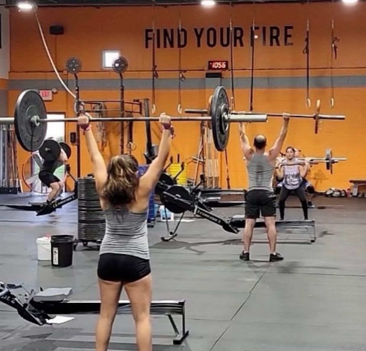 A gym with a sign that says find your fire