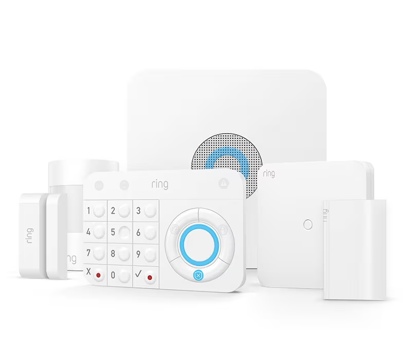 Ring home security system, white components: keypad, base station, sensors.
