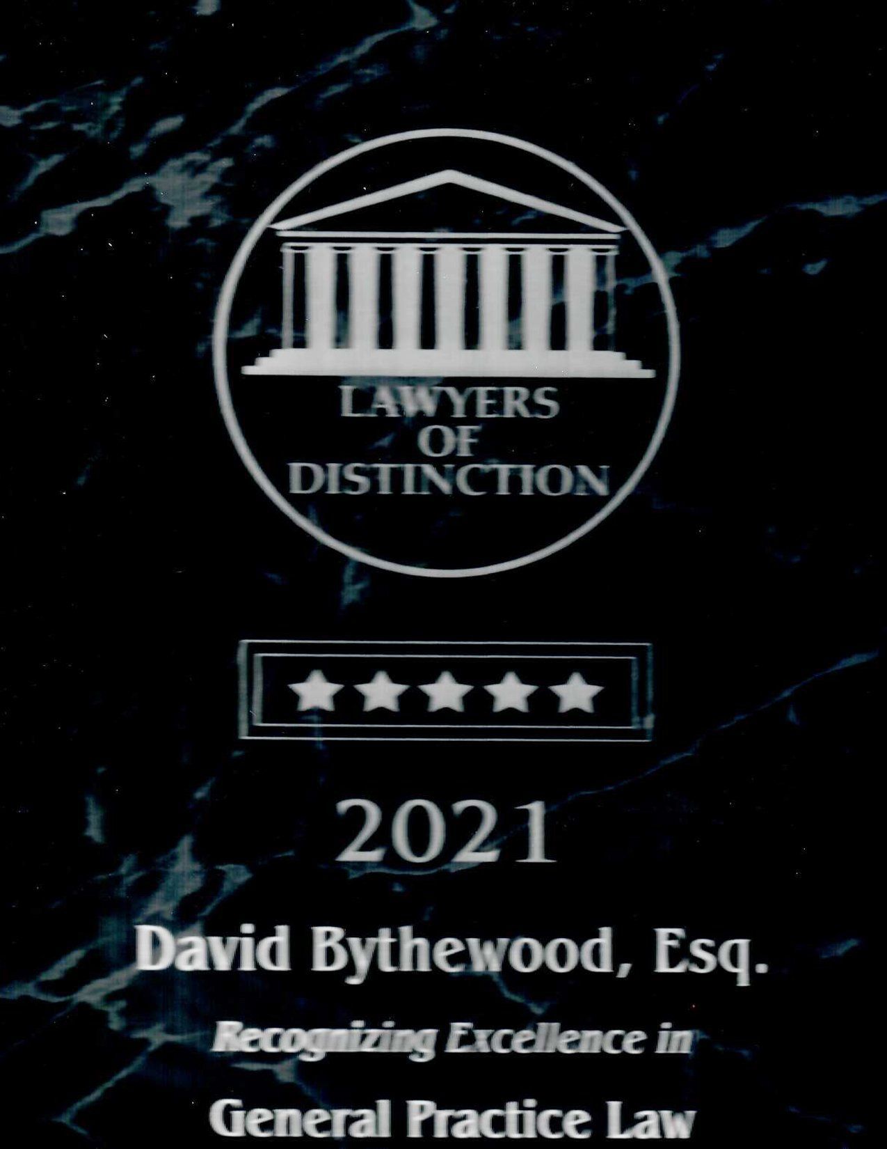 A plaque that says ' lawyers of distinction ' on it