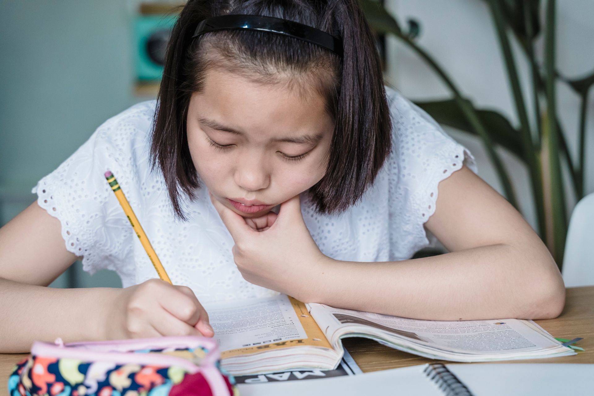 Student reviewing grade-level English readiness before term starts in HCMC