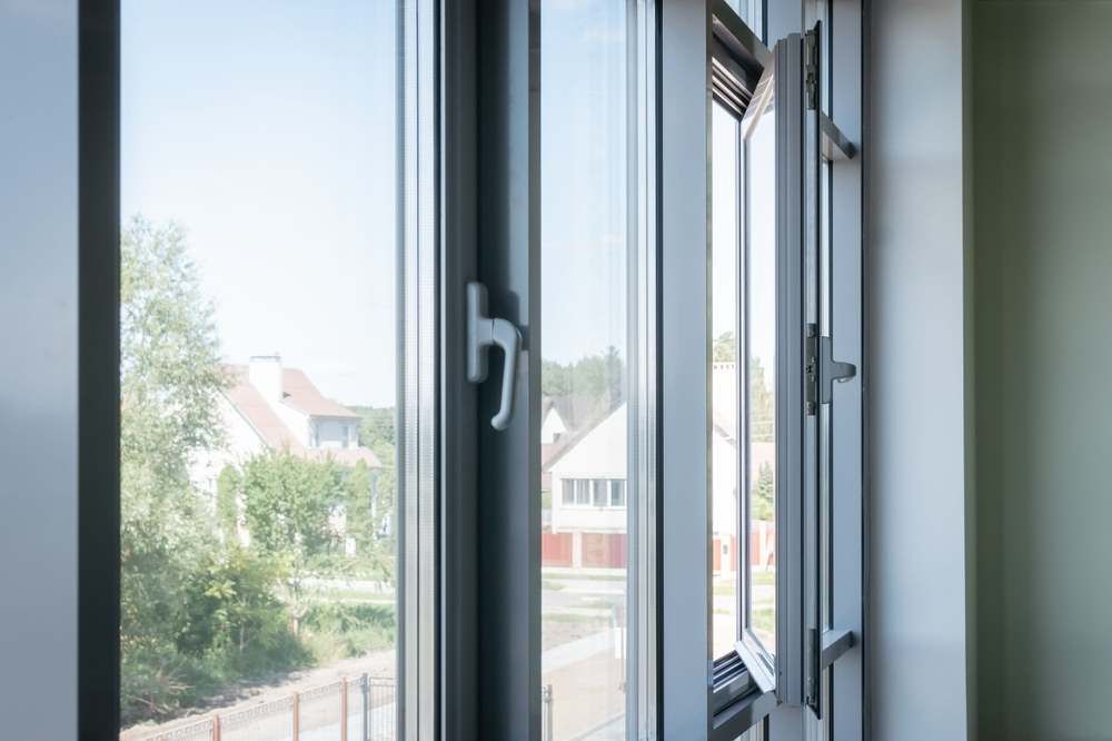 Open Window Overlooking a Tree-lined Street — Capitol Glass in Taminda, NSW