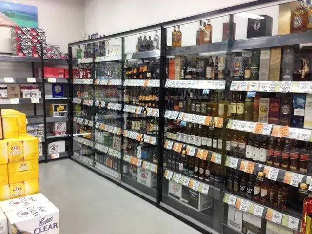 Liquor Shelf with Glass Door — Capitol Glass in Taminda, NSW